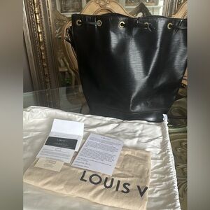 BLACK 
Louis Vuitton Black Epi Noe Bucket Bag. New one retails for $4,100